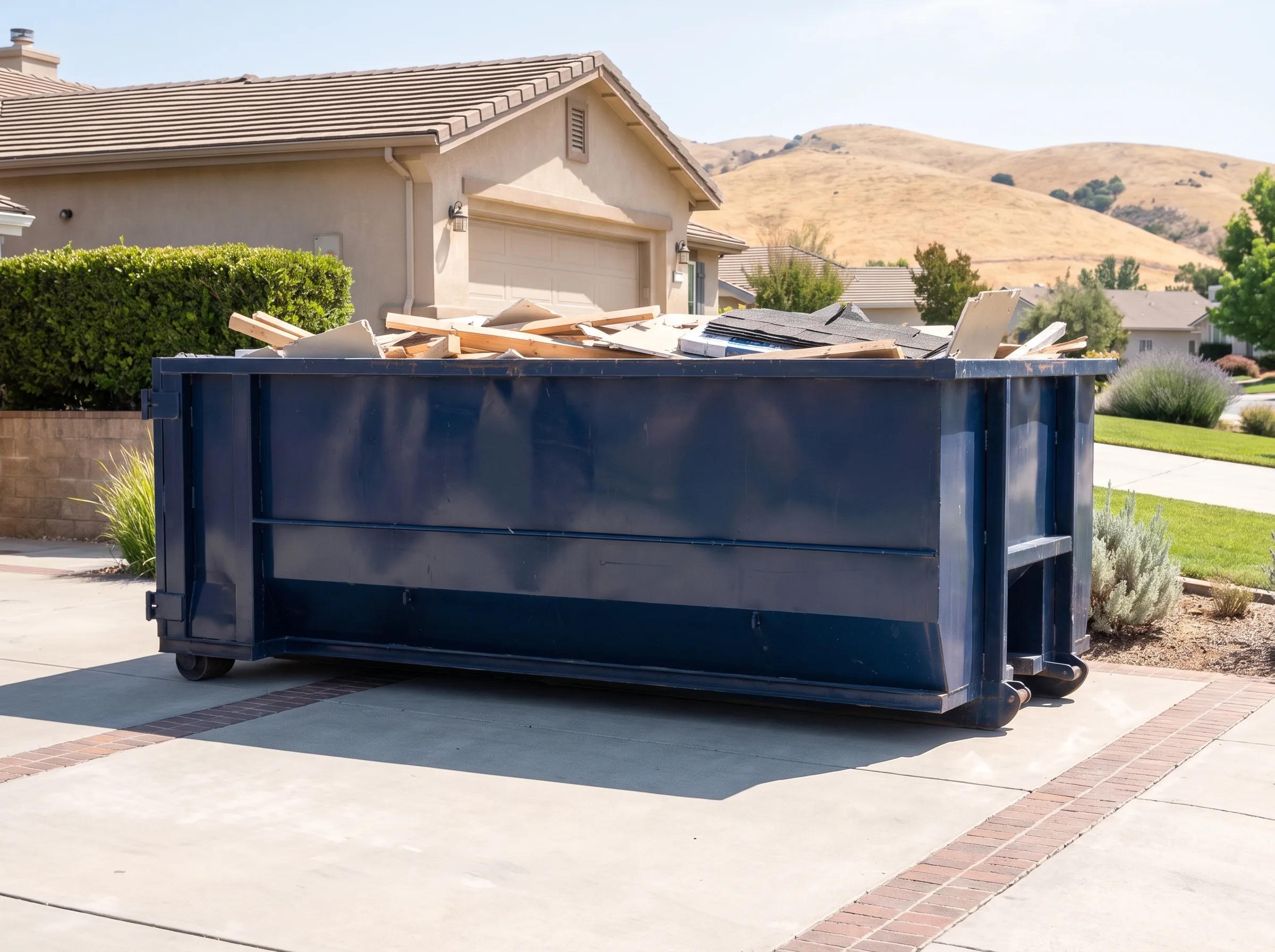 Roll-off dumpster being loaded in Contra Costa County, CA